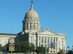 Oklahoma City and State Capitol building with 'The Guardian' atop.